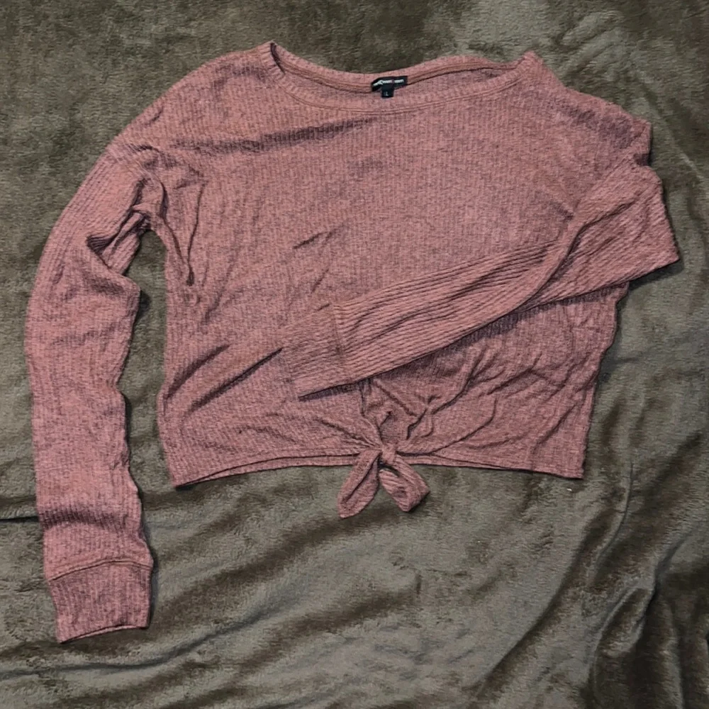Long sleeve crop top with a knot in the front. - Picture 1 of 3